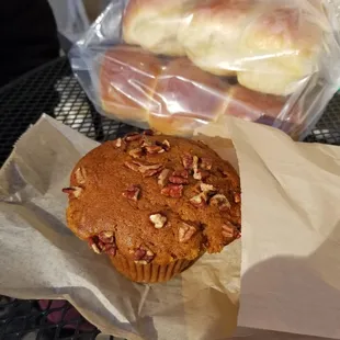 Pumpkin pecan muffin and a dozen dinner rolls.