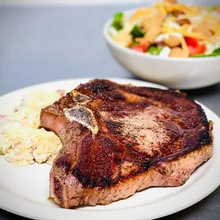 a steak and side salad