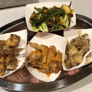 Made to order wing sauces! I've never heard of such a thing! Caribbean Jerk, Chipotle Pineapple &amp; Garlic Parmesan! Fantastic!