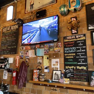 a bar with a large screen tv