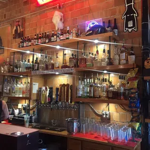 a woman behind the bar