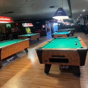 Lots of pool tables