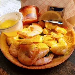 a bowl of shrimp and potatoes