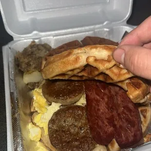 Waffles eggs cheese 2 sausages and two big pieces of turkey bacon