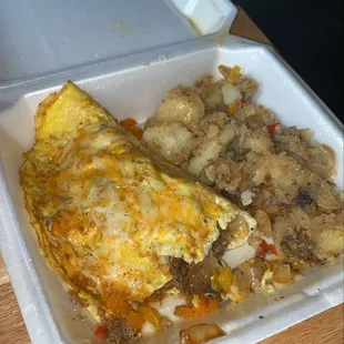 Omelette and an extra scoop of potatoes.