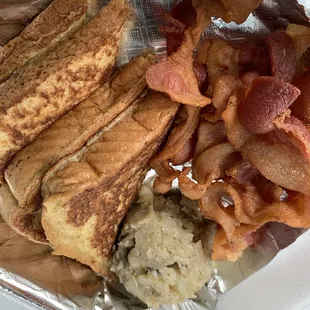 French Toast Plate with hash browns, eggs (no eggs for me) and double bacon.