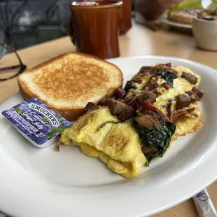 Bacon and sausage omelette with toast (fantastic toast)