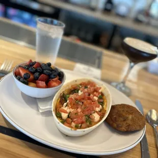 Omelette Casserole, potato pancake, and fruit bowl.