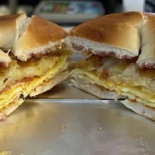 Turkey Bacon, Egg and Cheese, Hash Brown and Strawberry Jelly on a Plain Bagel