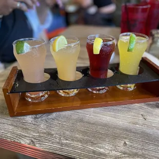 Mimosa flight! Guava mint, peach bellini, blueberry pom and mango habanero