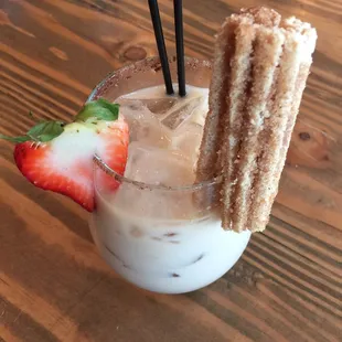 Hennessy and Horchata with Churro and strawberry
