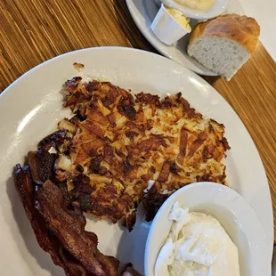 Classic Breakfast w/ 2 Poached Eggs, Applewood Smoked Bacon, Crispy Hash Browns, Biscuit and a side of Country Gravy