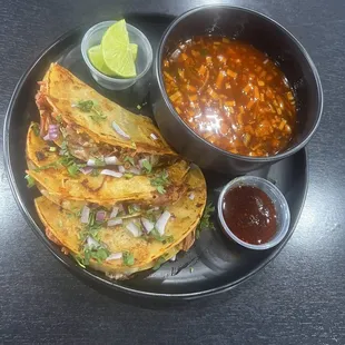Quesabirria tacos and consomé