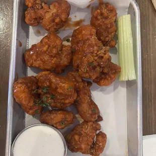 Bone in buffalo  sauce chicken wings