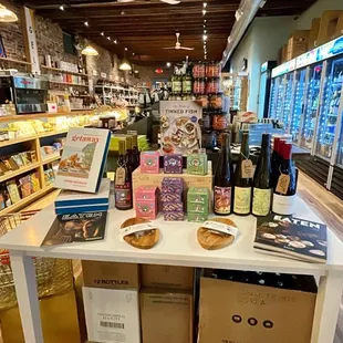 a display of wine and snacks