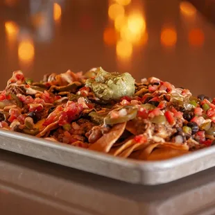 Platter of nachos with all the fixings at Brew Brothers.