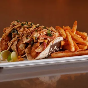 Three tacos and fries at Brew Brothers.