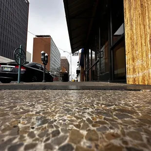 a cobblestone street in a city