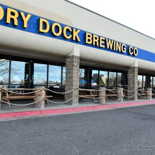 Right next to Dry Dock Brewing Co.
