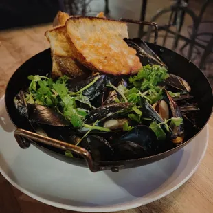 Mussels with coconut milk, curry spices, and lemongrass. Yum!