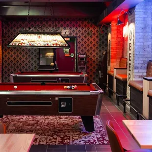 a billiards table and a pool table
