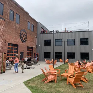 Lawn seating below roof patio.