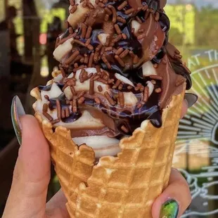 Swirl ice cream with hot fudge chocolate sprinkles and a cherry on top!!