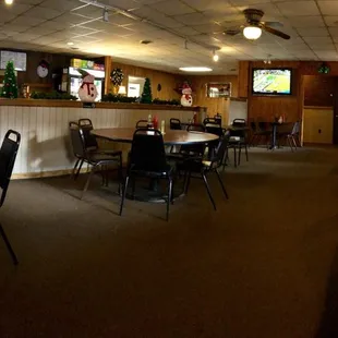a man sitting at a table in a restaurant