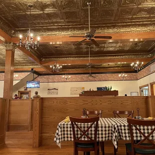a dining room with tables and chairs