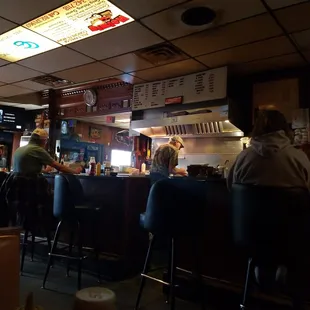 Handmade patties on a flat top