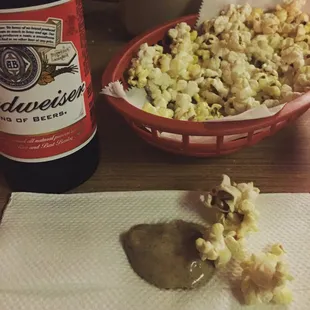 Popcorn dipped in mustard with a Budweiser. The appetizer du jour.