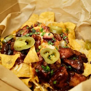 Pork belly nachos. Not shown is a side of sour cream and pico de gallo.