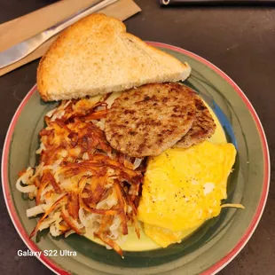 Hash browns, side of sausage, scrambled eggs and toast