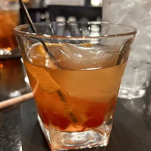 a drink in a glass on a table