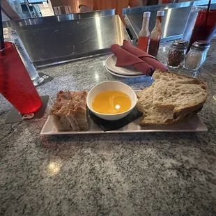Bread and oil appetizer.