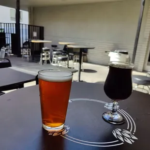 a beer and a glass on a table