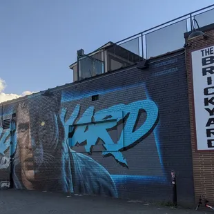 a mural of a man on a motorcycle