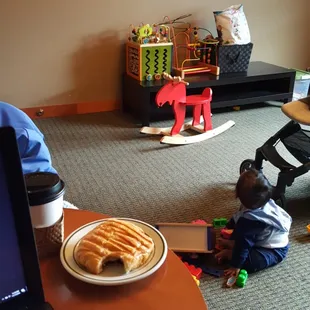 Coffee, pastry and a playroom. What more could I ask for?