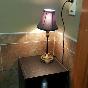 I love this lamp and table... that&apos;s in the bathroom. Really relaxing. Haha!