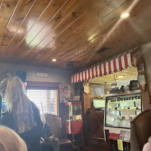 a man and a child in a restaurant