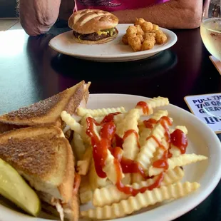 Turkey melt w/fries; hamburger &amp; tater tots.