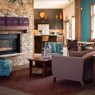Enjoy a cup of coffee by our beautiful clubhouse fireplace