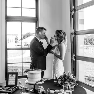 This is how we set up our cake table with cookies there as well. We loved the big garage door windows and opened them during the reception