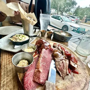 4 meats plate , grits and Parmesan Brussels sprouts
