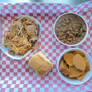 Pulled pork with baked beans and yams.