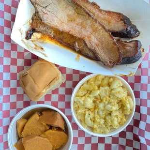 Brisket with mac and cheese and yams.