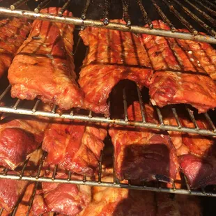 the meat being cooked in the oven