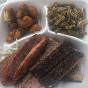 Three meat plate: ribs, brisket, jalapeño sausage, fried okra and green beans.