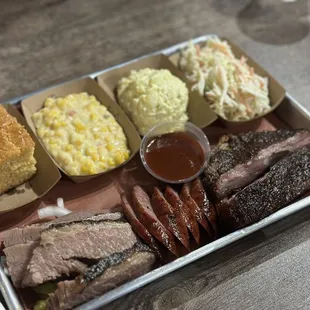 a variety of meats and sides