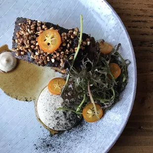 Pork Belly with charred shallot, celery root, pickled kumquat, puffed buck wheat and jus
